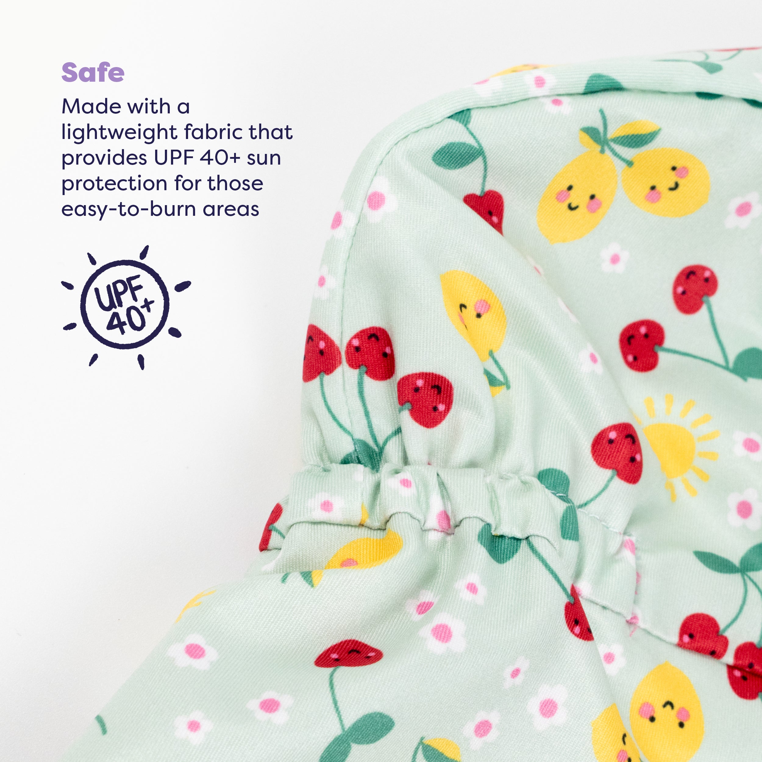 UPF 40+ Reversible Swim Hat for Babies and Toddlers in Juicy Fruit - Bambino Mio (EU)