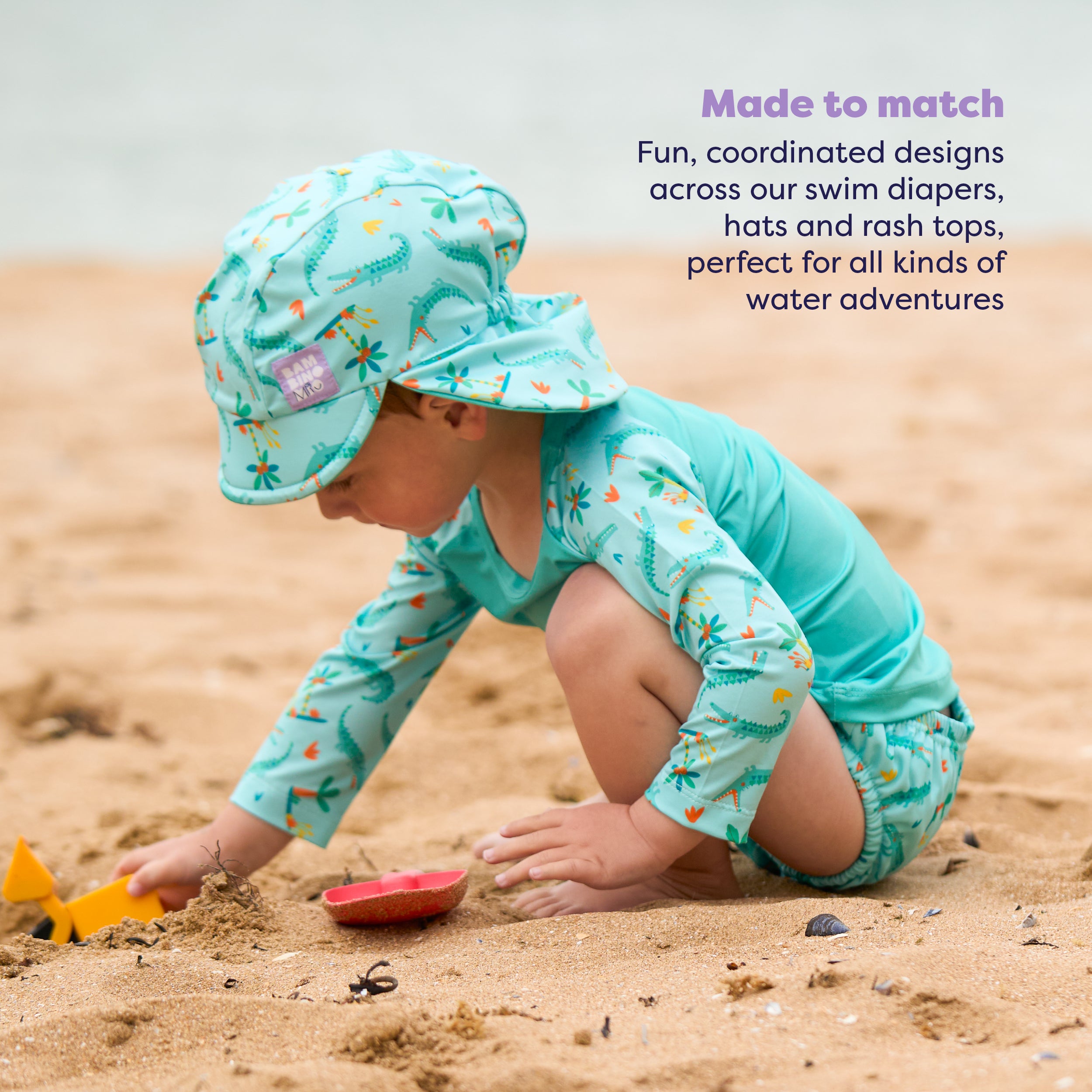 UPF 40+ Reversible Swim Hat for Babies and Toddlers in Crafty Croc - Bambino Mio (EU)