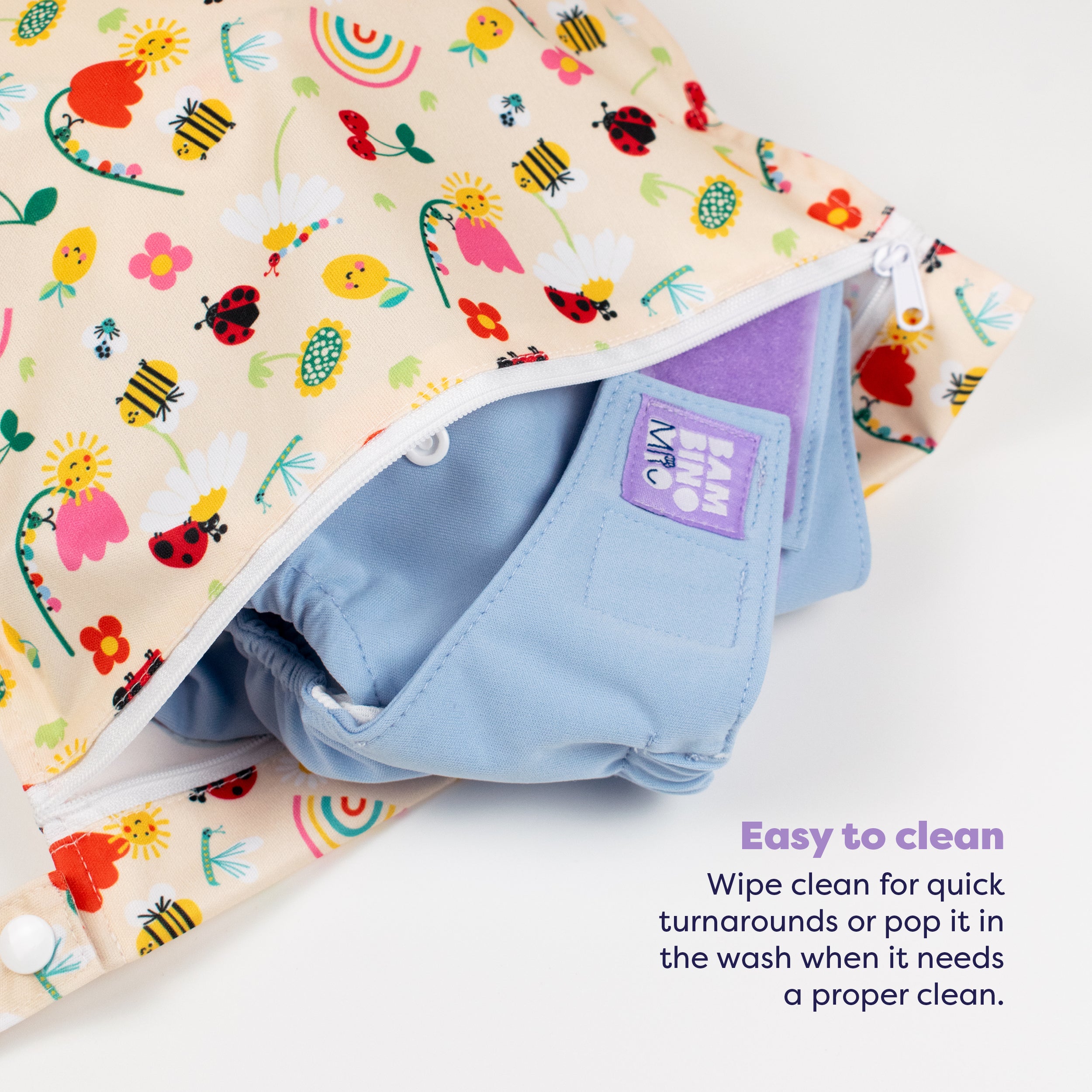 Out and About Waterproof Wet Diaper Bag in Sunshine Friends - Bambino Mio (EU)