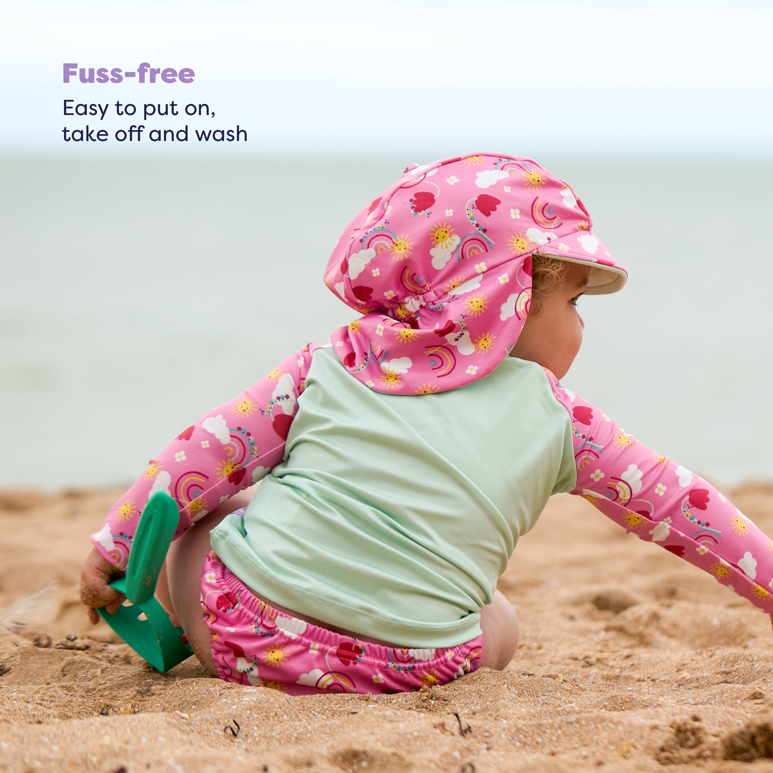 UPF 40+ Reversible Swim Hat for Babies and Toddlers in Happy Days - Bambino Mio (EU)