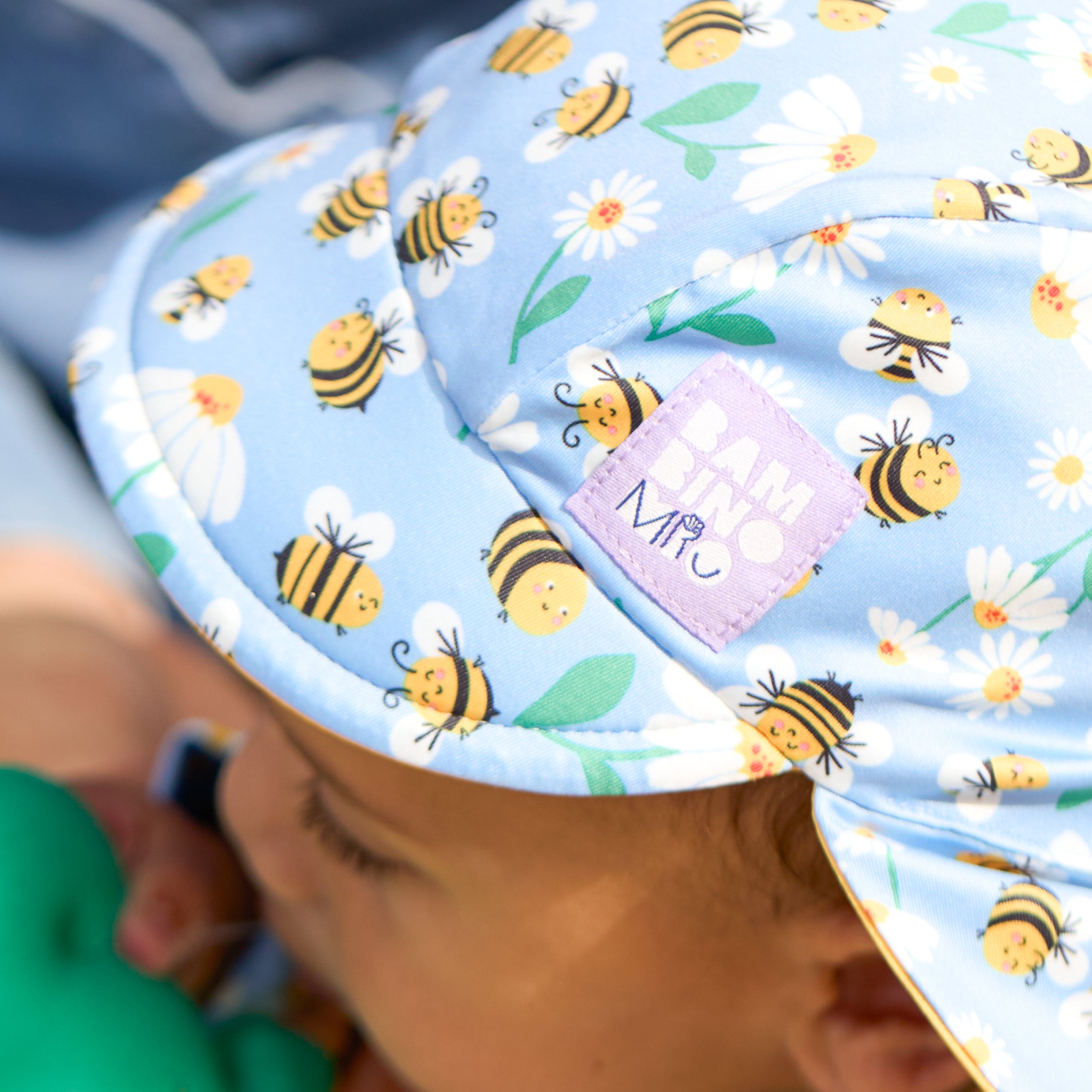 UPF 40+ Reversible Swim Hat for Babies and Toddlers in Busy Bees - Bambino Mio (EU)