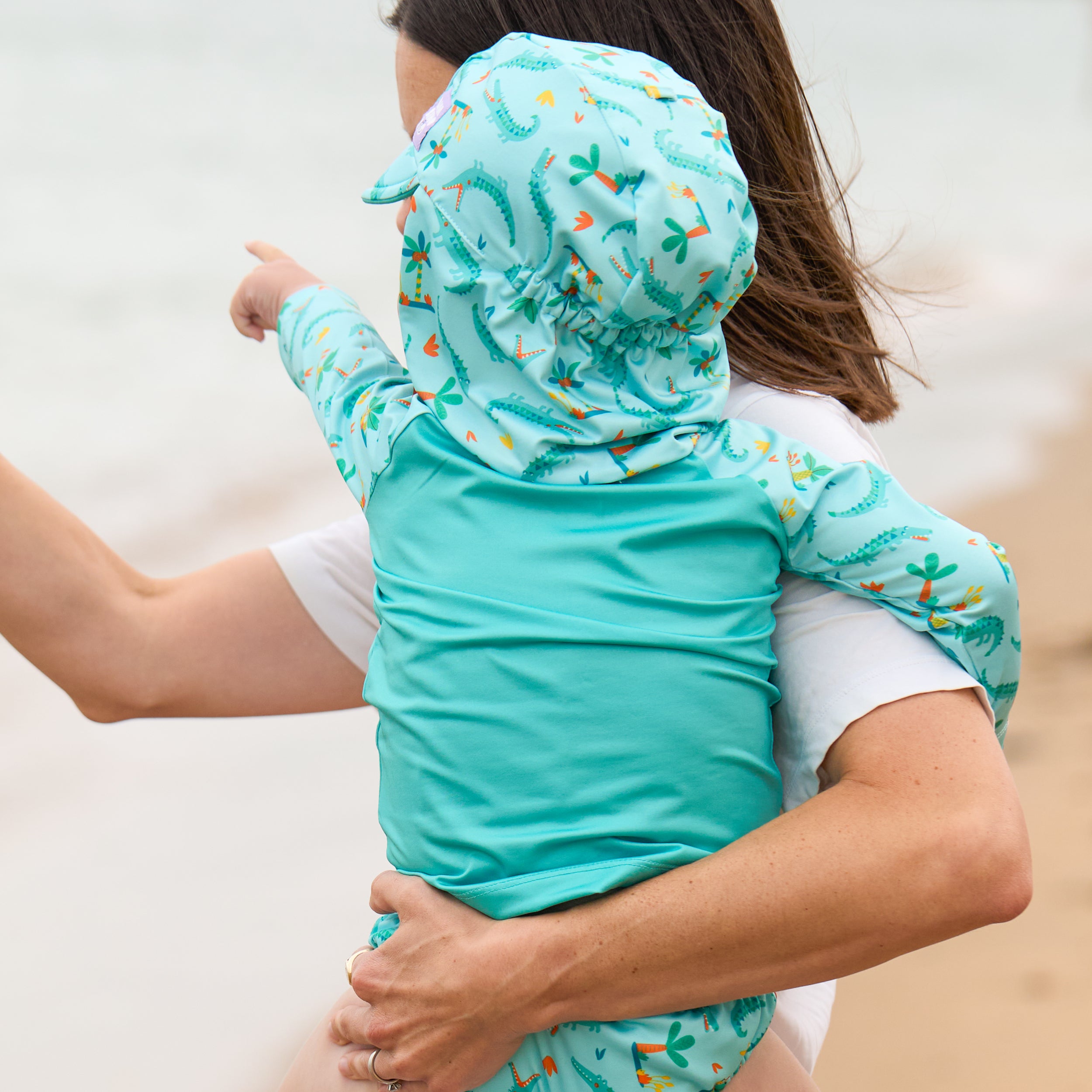 UPF 40+ Reversible Swim Hat for Babies and Toddlers in Crafty Croc - Bambino Mio (EU)