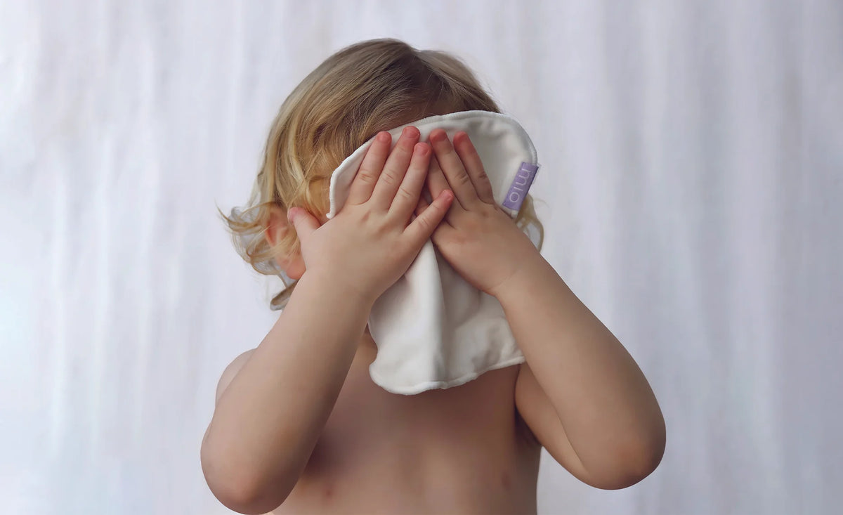 baby wiping face