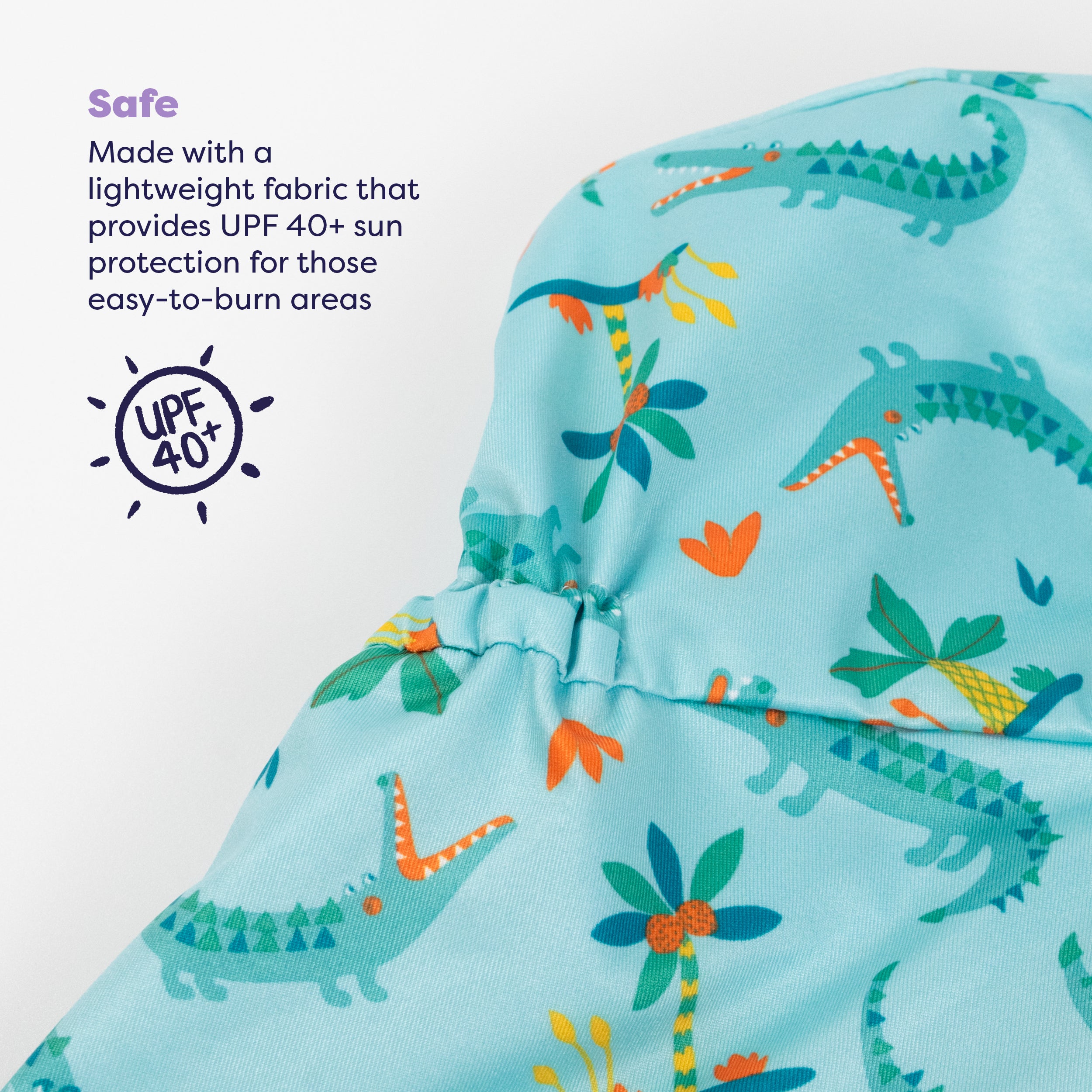 UPF 40+ Reversible Swim Hat for Babies and Toddlers in Crafty Croc - Bambino Mio (EU)