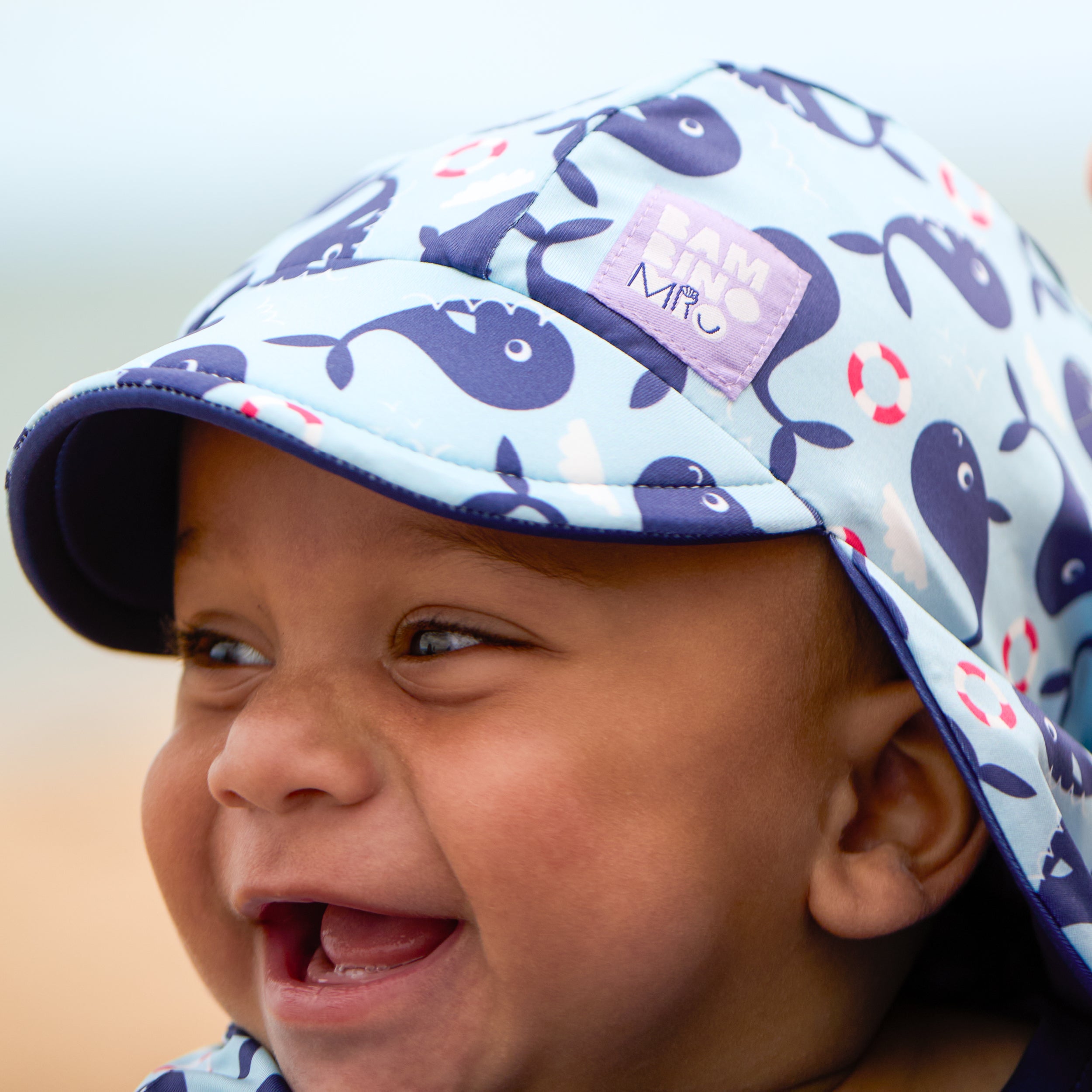 UPF 40+ Reversible Swim Hat for Babies and Toddlers in Blue Whale - Bambino Mio (EU)