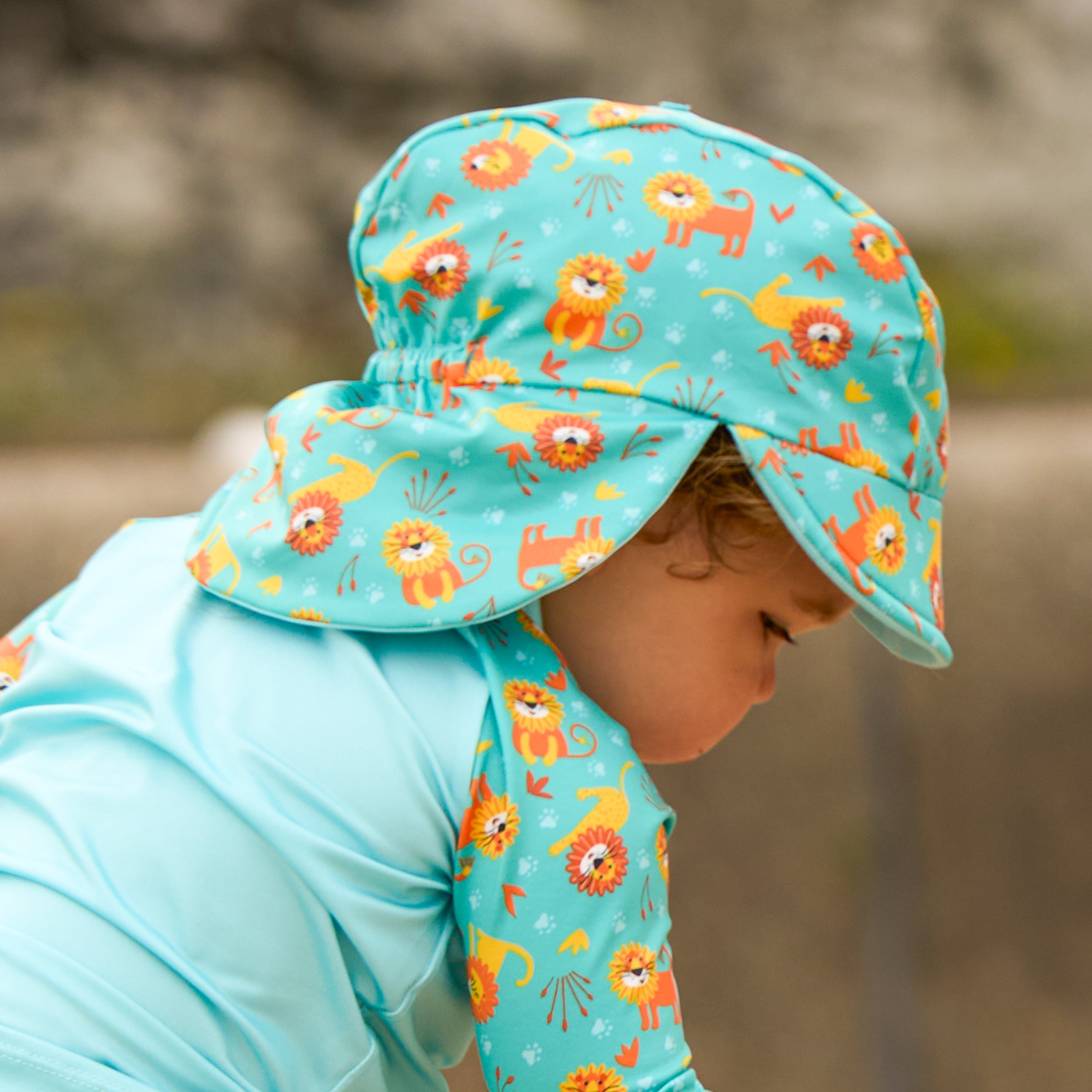 UPF 40+ Reversible Swim Hat for Babies and Toddlers in Cool Cats - Bambino Mio (EU)