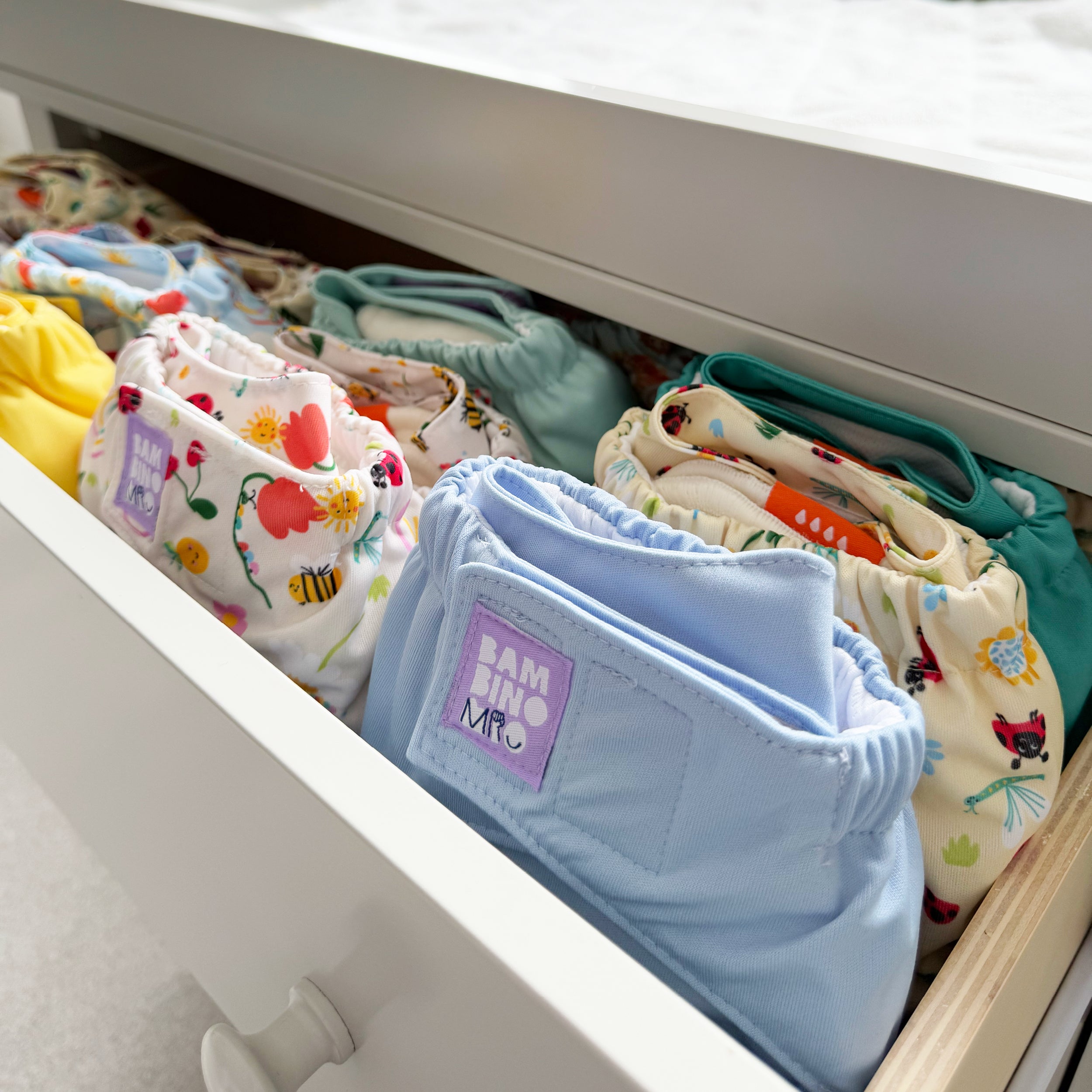 The Essentials Reusable Diaper Bundle in Wildlife + Pastels